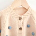 Pompom Cashmere Baby Cardigan Sweater for custom baby knitwear OEM ODM supplier
