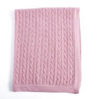 Pink cashmere cable knit baby blanket rolled up display