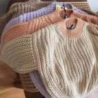 chunky knit baby sweater winter jumper back view flat lay product photo
