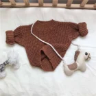 chunky knit baby sweater winter jumper texture and fabric detail photo