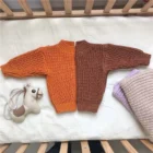 chunky knit baby sweater winter jumper lifestyle or baby wearing photo