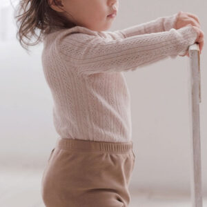 crochet knit baby girl vintage sweater front view flat lay product photo