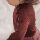 crochet knit baby girl vintage sweater back view flat lay product photo