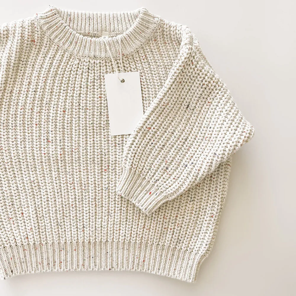 Chunky Knit Speckle Cotton Baby Sweater Pullover - Product Image 1 chunky knit speckle cotton baby sweater pullover front view flat lay product photo