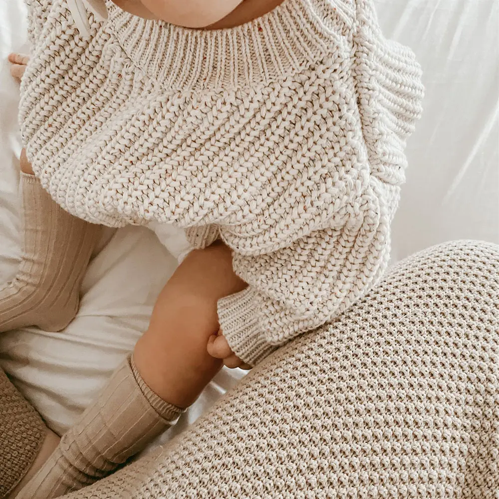 chunky knit speckle cotton baby sweater pullover lifestyle or baby wearing photo