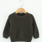 organic cotton baby jumper sweater texture and fabric detail photo