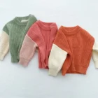 organic cotton chunky knitted baby sweater jumper front view flat lay product photo