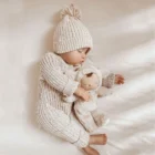 speckle cotton ribbed knit baby jumpsuit romper front view flat lay product photo