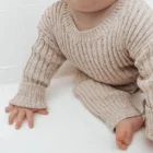 speckle cotton ribbed knit baby jumpsuit romper back view flat lay product photo