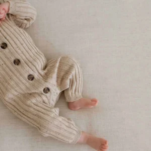 speckle cotton ribbed knit baby romper front view flat lay product photo