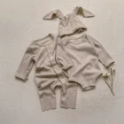 speckle cotton ribbed knit baby romper set front view flat lay product photo
