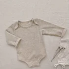 speckle cotton ribbed knit baby romper set side view or detail closeup photo