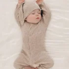 speckle cotton ribbed knit baby romper set texture and fabric detail photo