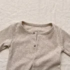 speckle cotton ribbed knit baby romper set closeup detail product photo