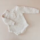 speckle knit cotton baby romper knitwear front view flat lay product photo