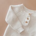 speckle knit cotton baby romper knitwear lifestyle or baby wearing photo