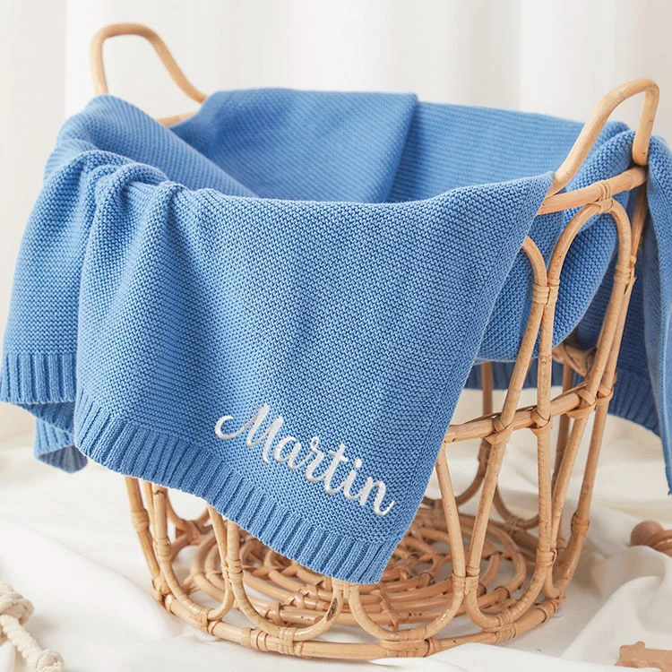 knitted baby swaddle wrap blanket texture and fabric detail photo