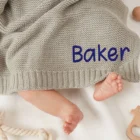 knitted baby swaddle wrap blanket lifestyle or baby wearing photo