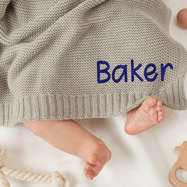 knitted baby swaddle wrap blanket lifestyle or baby wearing photo