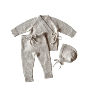 organic cotton baby cardigan pants set front view flat lay product photo