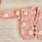 organic cotton baby girl cardigan sweater front view flat lay product photo