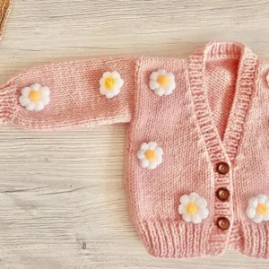 organic cotton baby girl cardigan sweater front view flat lay product photo