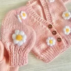 organic cotton baby girl cardigan sweater back view flat lay product photo