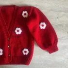 organic cotton baby girl cardigan sweater lifestyle or baby wearing photo