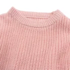 organic cotton chunky knit toddler baby sweater side view or detail closeup photo