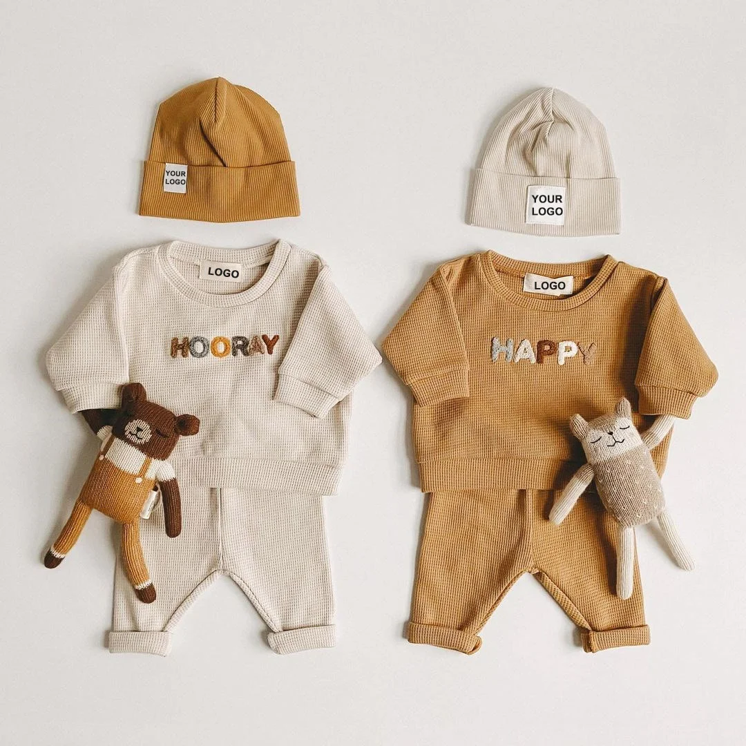 Winter Newborn Baby Knit Jogger Set - Product Image 1 winter newborn baby knit jogger set front view flat lay product photo