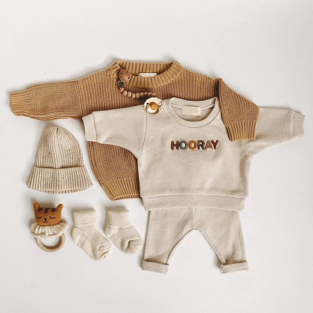 winter newborn baby knit jogger set back view flat lay product photo