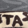 Close-up comparison of jacquard and intarsia knitwear showing different yarn and pattern structures
