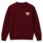 Burgundy crew neck sweater with a small animal intarsia motif on the left chest