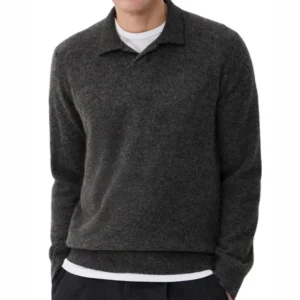 Dark gray cashmere sweater with an open polo collar and long sleeves worn by a male model
