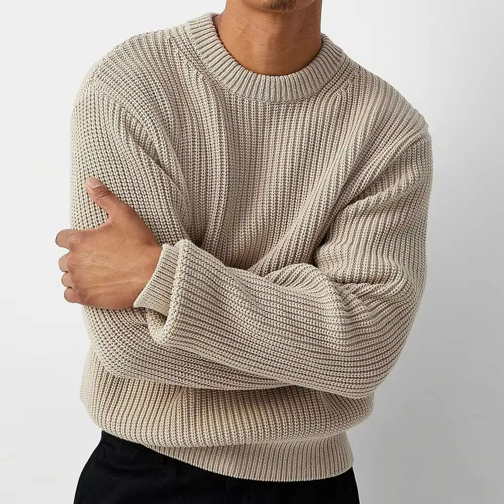 Custom Men Chunky Knit Cotton Crew Neck Pullover Sweater - Image 2 Oatmeal chunky knit cotton sweater with a crew neck worn by a male model