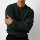 Dark green version of the chunky knit cotton crew neck sweater