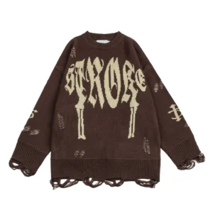 Brown crew neck sweater with STRACORE in cream gothic lettering above two dagger motifs, with long loose yarn loops at cuffs and hem