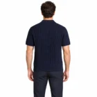 Male model wearing the navy ribbed knit polo, back view
