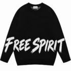 Black crew neck sweater with a knitted white FREE SPIRIT slogan across the front