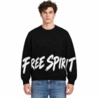 Male model wearing the black slogan jacquard crew neck sweater